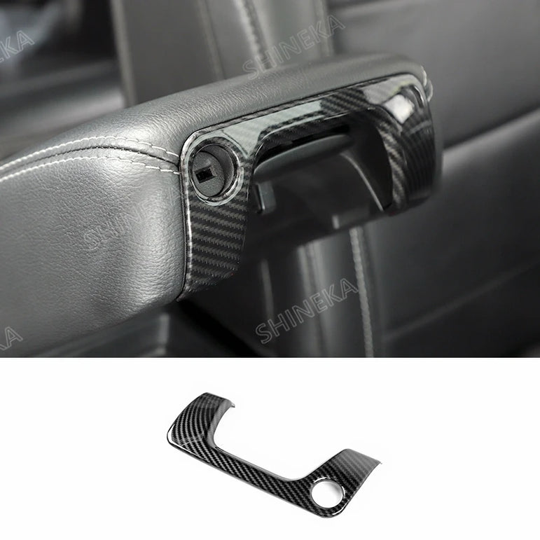 Armrest box keyhole